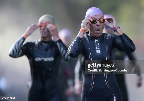 Competitors prepare to enter the water for the 2nd time during the Iron Man Triathlon in Bolton on July 15, 2018 in Bolton, England.