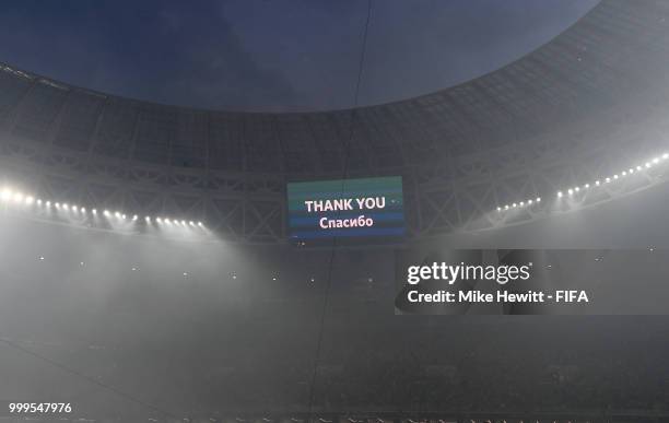 General view inside the stadium as a screen displays a message of thanks, following the 2018 FIFA World Cup Final between France and Croatia at...