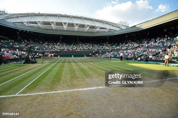 General view of the state of the grass on centre court on the final day of the 2018 Wimbledon Championships at The All England Lawn Tennis Club in...