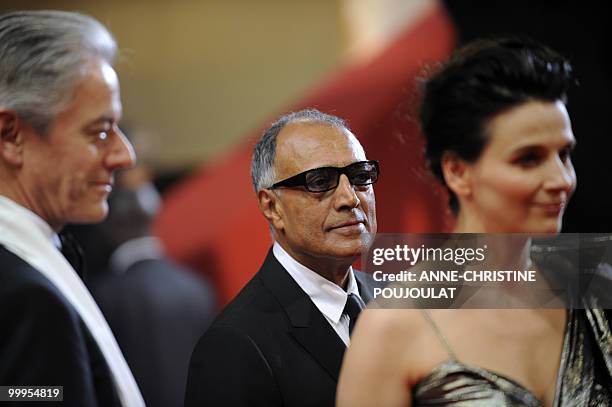 British actor William Shimell, French actress Juliette Binoche and Iranian director Abbas Kiarostami arrive for the screening of "Copie Conforme...