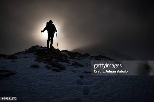 solar eclipse and the conqueror - eclipse foto e immagini stock