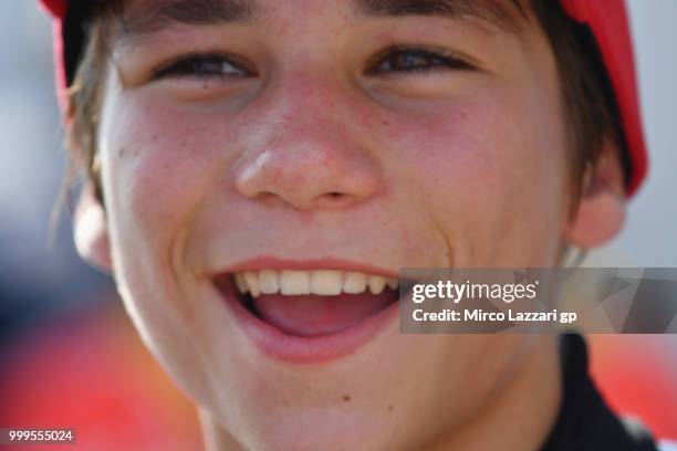 Deniz Oncu of Turkie celebrates the second place under the podium at the end of the RookiesCup race during the MotoGp of Germany - Race at...