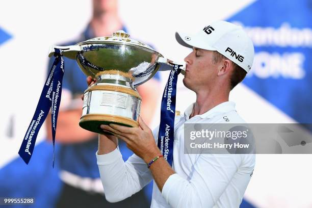 Brandon Stone of South Africa celebrates victory with the trophy during day four of the Aberdeen Standard Investments Scottish Open at Gullane Golf...