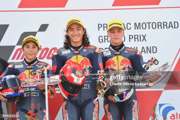 Deniz Oncu of Turkie, Can Oncu of Turkie and Filip Salac of Czech Rep. Celebrate on the podium at the end of the RookiesCup race during the MotoGp of...