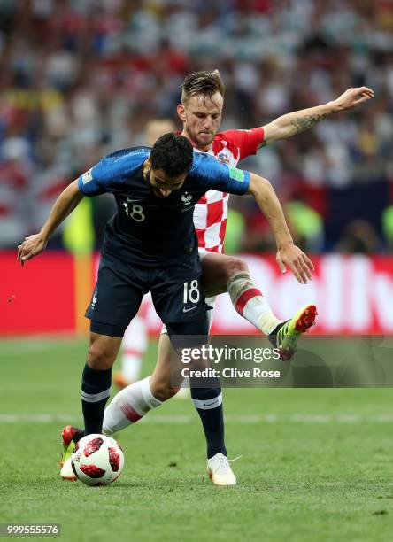Nabil Fekir of France and Ivan Rakitic of Croatia compete for the ball during the 2018 FIFA World Cup Final between France and Croatia at Luzhniki...