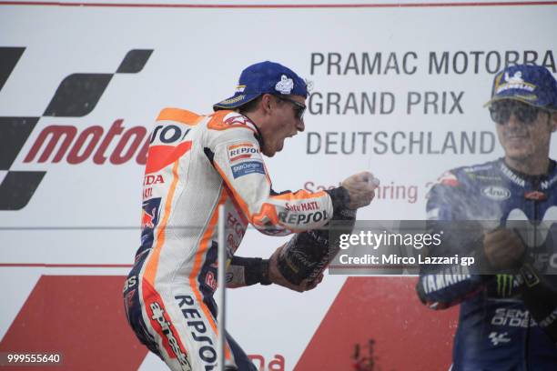 Marc Marquez of Spain and Repsol Honda Team and Maverick Vinales of Spain and Movistar Yamaha MotoGP celebrate on the podium at the end of the MotoGP...