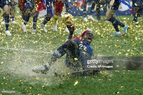 Benjamin Mendy of France, with world cup trophy, FIFA World Cup during the 2018 FIFA World Cup Russia Final match between France and Croatia at the...