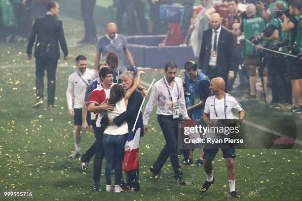 Didier Deschamps, Manager of France celebrates victory with his family following the 2018 FIFA World Cup Final between France and Croatia at Luzhniki...