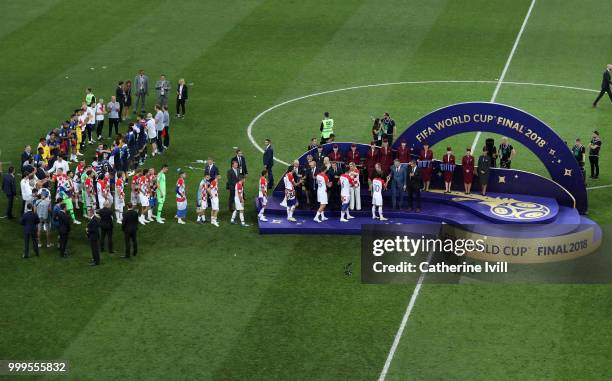 Players from Croatia are presented with their runner up medals following the 2018 FIFA World Cup Final between France and Croatia at Luzhniki Stadium...