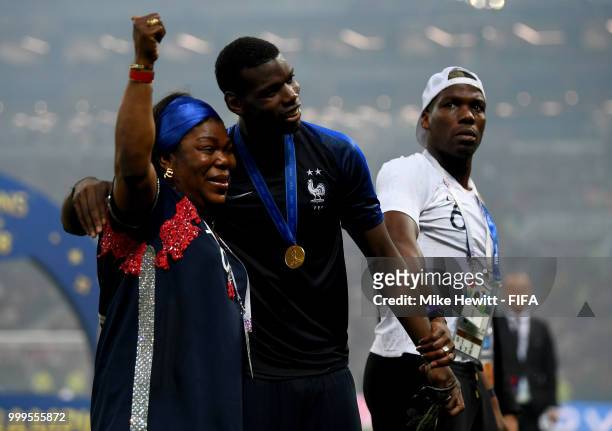 Paul Pogba of France celebrates with his mother, Yeo Pogba, following France's victory in the 2018 FIFA World Cup Final between France and Croatia at...