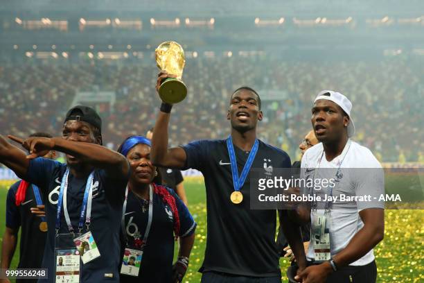 Paul Pogba of France celebrates victory with mother Yeo and brothers Mathias and Florentin at the end of of the 2018 FIFA World Cup Russia Final...