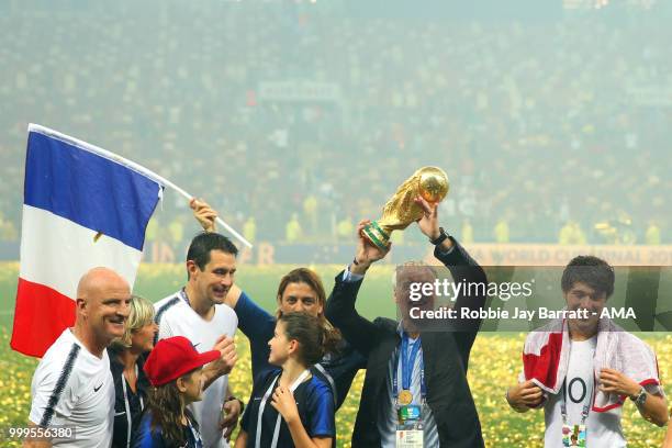 Didier Deschamps, Manager of France celebrates victory with son Dylan at the end of of the 2018 FIFA World Cup Russia Final between France and...