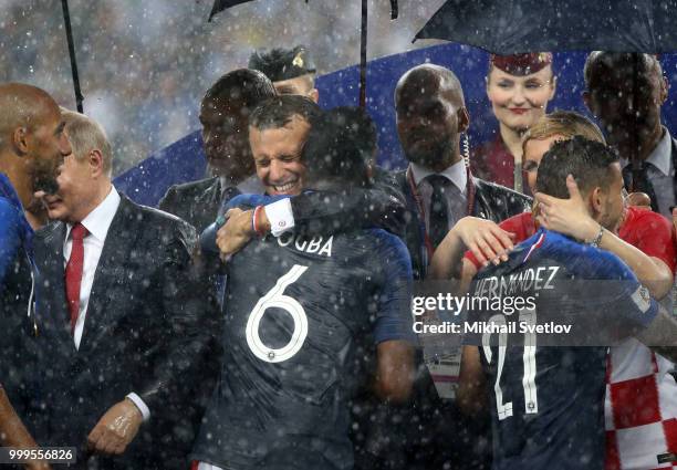 Russian President Vladimir Putin, French President Emmanuel Macron, Croatian President Kolinda Grabar-Kitarovic attend the 2018 FIFA World Cup final...