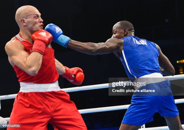 The Cuban boxer Erislandy Savon fights against the Kazakh boxer Vassiliy Levit in the heavy weight class during the Ameteur's Boxing World...