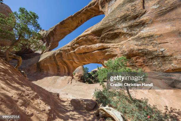 double o arch, natural arch, arches national park, moab, utah, united states - double arch stock pictures, royalty-free photos & images