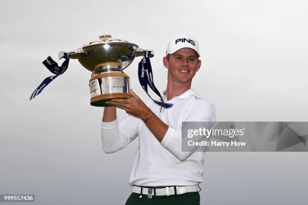 Brandon Stone of South Africa celebrates victory with the trophy during day four of the Aberdeen Standard Investments Scottish Open at Gullane Golf...