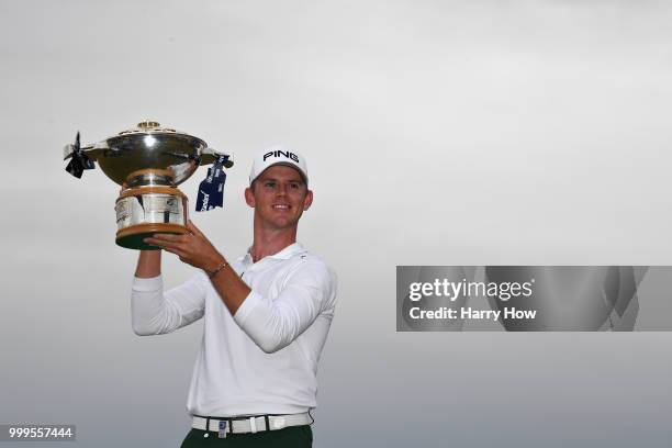 Brandon Stone of South Africa celebrates victory with the trophy during day four of the Aberdeen Standard Investments Scottish Open at Gullane Golf...