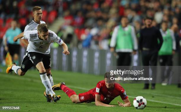 Germany's Matthias Ginter and Czech Republic's Jan Kopic vie for the ball during the soccer World Cup qualification group stage match between the...