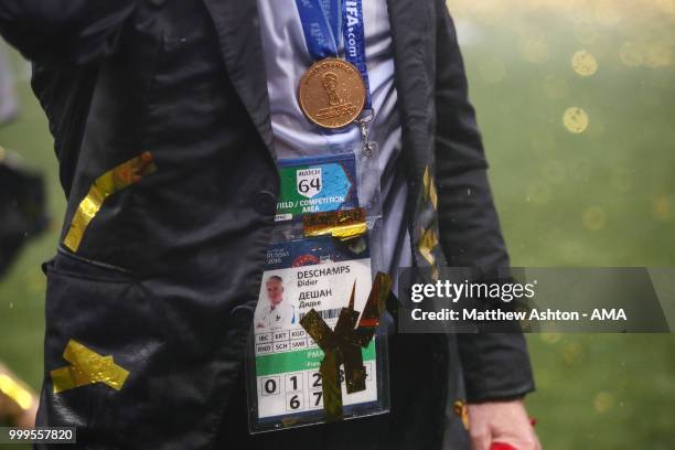 Didier Deschamps head coach / manager of France with the World Cup winners medal around his neck and tournament accrediation during the 2018 FIFA...