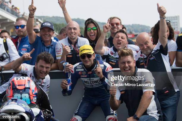 Jorge Martin of Spain and Del Conca Gresini Moto3 celebrates the victory with team under the podium at the end of the Moto3 race during the MotoGp of...
