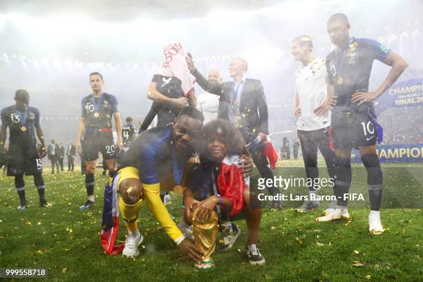 Steve Mandanda celebrates victory following the 2018 FIFA World Cup Final between France and Croatia at Luzhniki Stadium on July 15, 2018 in Moscow,...