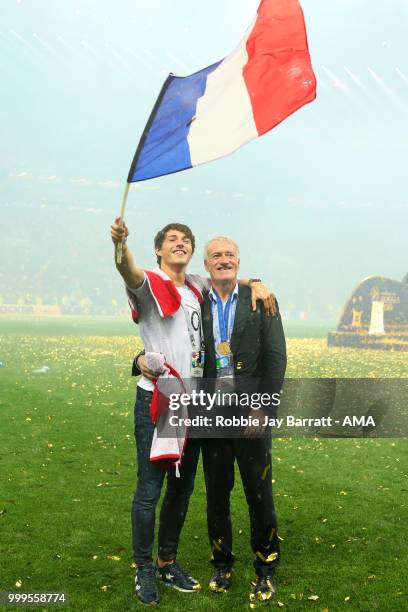 Didier Deschamps, Manager of France celebrates victory with son Dylan at the end of of the 2018 FIFA World Cup Russia Final between France and...