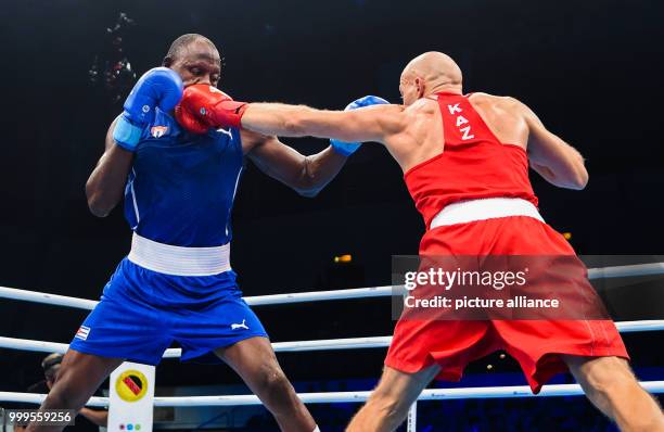 The Cuban boxer Erislandy Savon fights against the Kazakh boxer Vassili Levit in the half heavyweight class during the Ameteur's Boxing World...