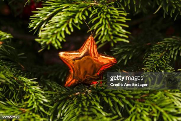 christmas decoration on christmas tree, germany - jager foto e immagini stock