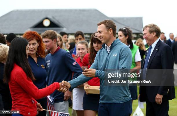 Open Champion Jordan Spieth of United States of America hands out participating medals to junior players during the Junior Open Championship opening...