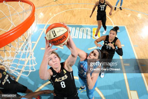 Carolyn Swords of the Las Vegas Aces grabs the rebound against Stefanie Dolson of the Chicago Sky on July 10, 2018 at the Wintrust Arena in Chicago,...