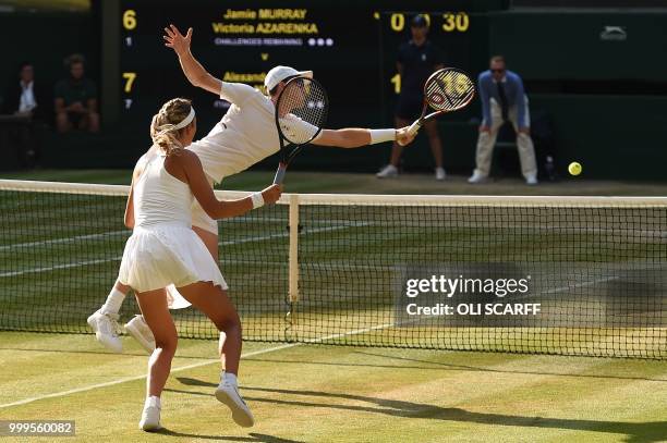 Britain's Jamie Murray and Belarus's Victoria Azarenka play against Austria's Alexander Peya and US player Nicole Melichar during their mixed doubles...