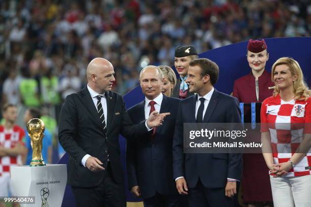 President Gianni Infantino, Russian President Vladimir Putin, French President Emmanuel Macron, Croatian President Kolinda Grabar-Kitarovic attend...