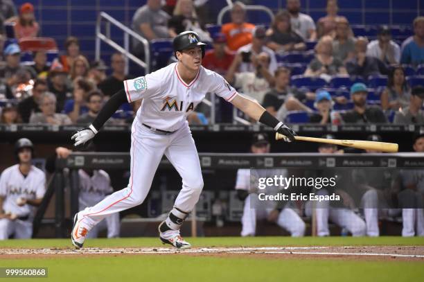 Brian Anderson of the Miami Marlins singles in the first inning against the Philadelphia Phillies at Marlins Park on July 15, 2018 in Miami, Florida.