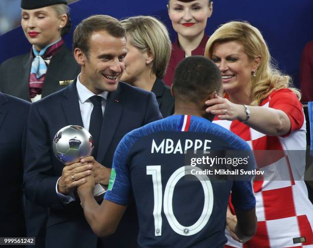 French President Emmanuel Macron, Croatian President Kolinda Grabar-Kitarovic attend the 2018 FIFA World Cup final awarding ceremony at Luzhniki...