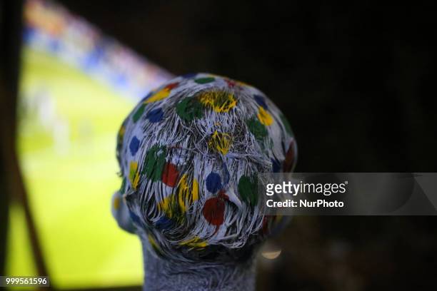 Dhaka, Bangladesh. A Bangladeshi soccer fan of France painted his head, watch FIFA 2018 World Cup Final match between France and Croatia on the big...