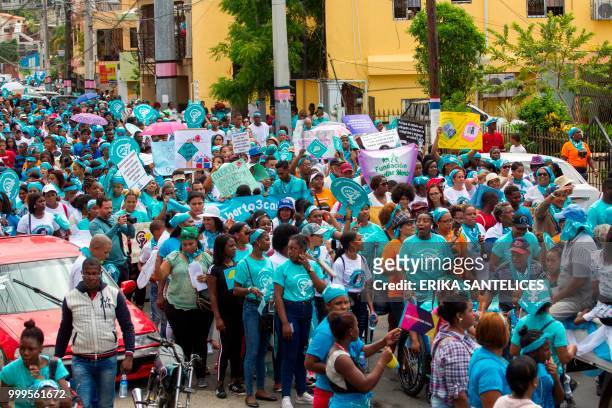 People take part in a march for the decriminalization of abortion in three circumstances -when the life of the pregnant woman is in danger, when the...
