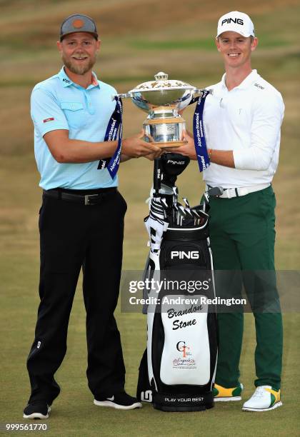 Brandon Stone of South Africa celebrates victory with the trophy during day four of the Aberdeen Standard Investments Scottish Open at Gullane Golf...