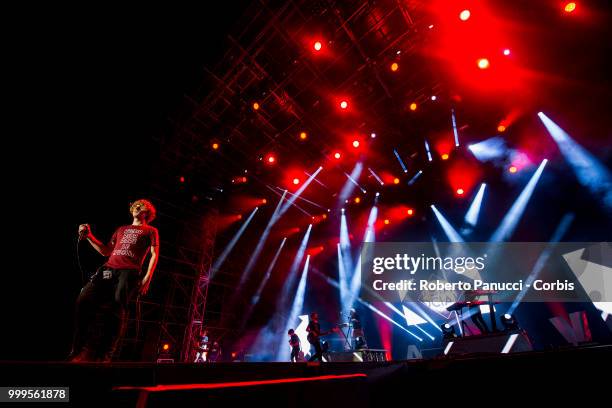 Lodovico Guenzi and his group Lo Stato Sociale performs on stage on July 14, 2018 in Rome, Italy.