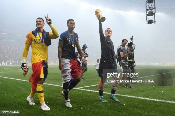 Antoine Griezmann of France celebrates with the World Cup Trophy following his sides victory in the 2018 FIFA World Cup Final between France and...