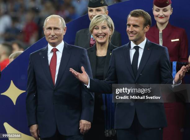 Russian President Vladimir Putin, French President Emmanuel Macron attend the 2018 FIFA World Cup final awarding ceremony at Luzhniki Stadium on July...
