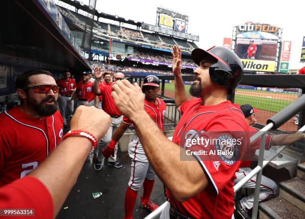 Anthony Rendon of the Washington Nationals celebrates scoring a run against the New York Mets in the second inning during their game at Citi Field on...