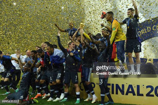 Hugo Lloris of France lifts the World Cup trophy to celebrate with his teammates after the 2018 FIFA World Cup Final between France and Croatia at...