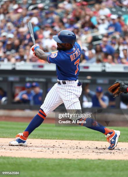 Jose Reyes of the New York Mets drives in a run in the second inning against the Washington Nationals during their game at Citi Field on July 15,...
