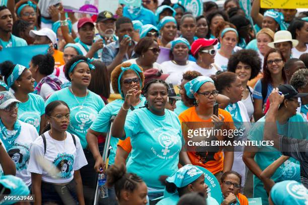 People take part in a march for the decriminalization of abortion in three circumstances -when the life of the pregnant woman is in danger, when the...
