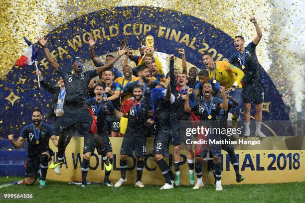 Hugo Lloris of France lifts the World Cup trophy to celebrate with his teammates after the 2018 FIFA World Cup Final between France and Croatia at...