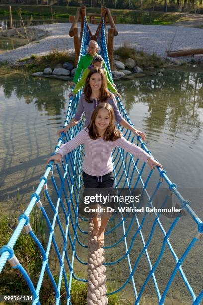 family visiting the erlebnispark wasser fisch natur adventure park, at murner see lake, near wackersdorf, upper palatinate lake district, upper palatinate, bavaria, germany - natuur stock pictures, royalty-free photos & images