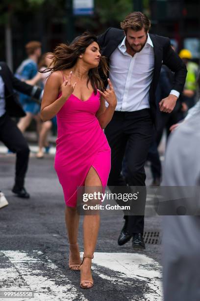 Priyanka Chopra and Liam Hemsworth are seen filming a scene for 'Isn't It Romantic?' in Midtown on July 15, 2018 in New York City.