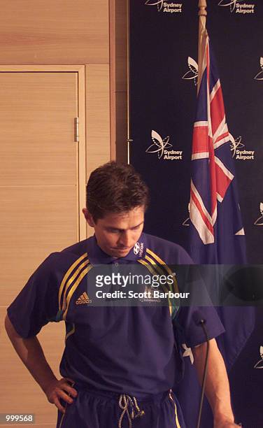 Australian coach Frank Farina is dejected after the Australian Socceroos return from Uruguay after failing to qualify for the 2002 FIFA World Cup...
