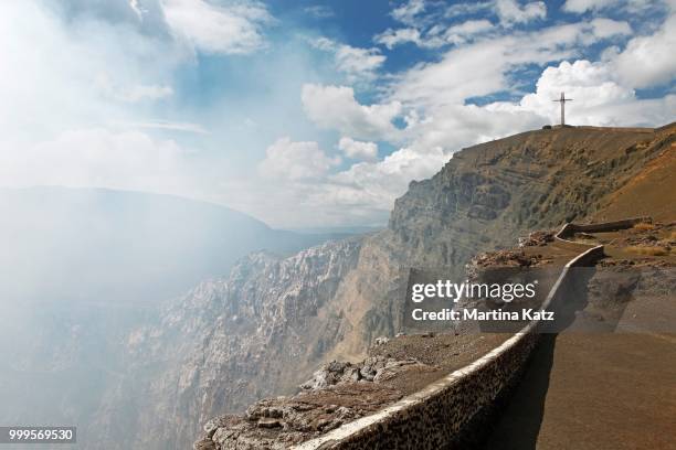 smoking crater rim with the bobadilla cross, masaya volcano, masaya province, nicaragua - bobadilla stock pictures, royalty-free photos & images