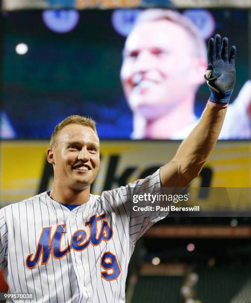 Brandon Nimmo of the New York Mets waves the the crowd after hitting a game winning walk off home run in the 10th inning in an MLB baseball game...